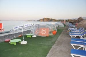 Beach furniture and carpeting cover Fethiye nesting beach